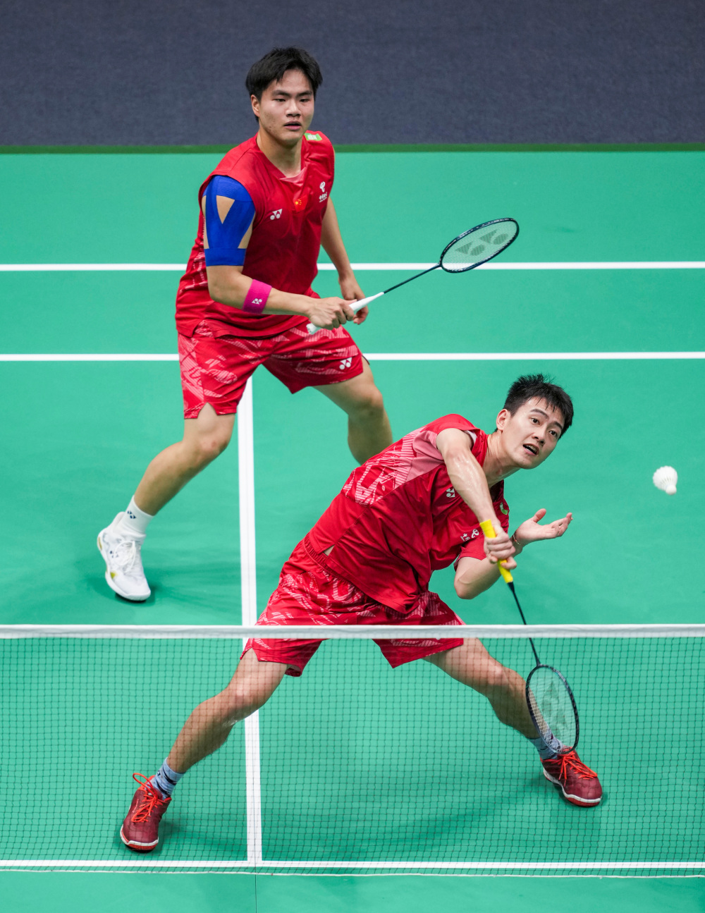 包含中国羽毛球队完胜泰国羽毛球队，陶菲克关键制胜的词条